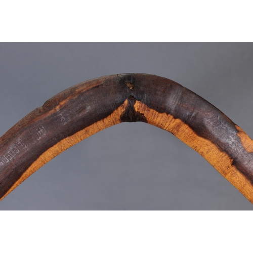 1212 - JACK MAY BOOMERANG, OAK VALLEY, PORT LINCOLN, SOUTH AUSTRALIA, Carved hardwood (with custom stand) A... 