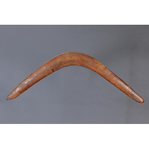 1218 - EARLY RETURNING BOOMERANG, NEW SOUTH WALES, Carved hardwood (with custom stand) An extremely fine an... 