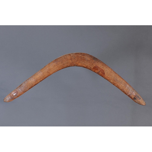 1218 - EARLY RETURNING BOOMERANG, NEW SOUTH WALES, Carved hardwood (with custom stand) An extremely fine an... 