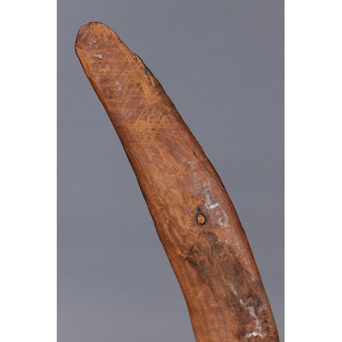 1222 - EARLY BOOMERANG, SOUTH EAST AUSTRALIAN, Carved hardwood and natural pigments (with custom stand) Of ... 