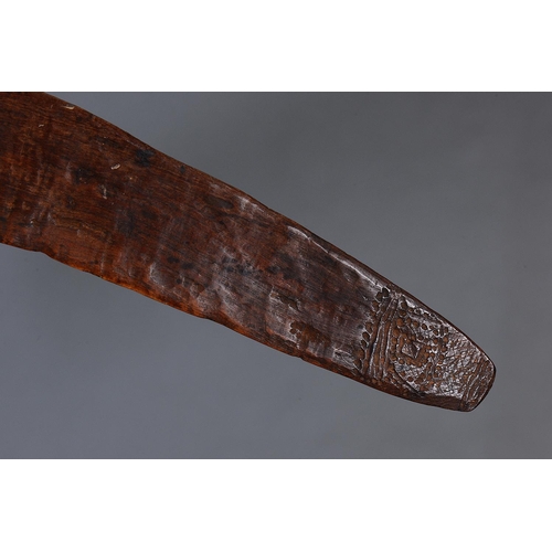 1296 - EARLY INCISED BOOMERANG, WESTERN AUSTRALIA, Carved and engraved hardwood (no custom stand) Of plano-... 
