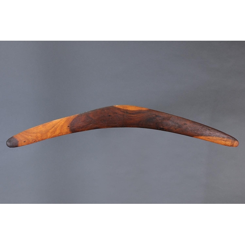 1302 - BOOMERANG, MACDONNELL RANGES, NORTHERN TERRITORY, Carved and engraved hardwood (no custom stand) Of ... 