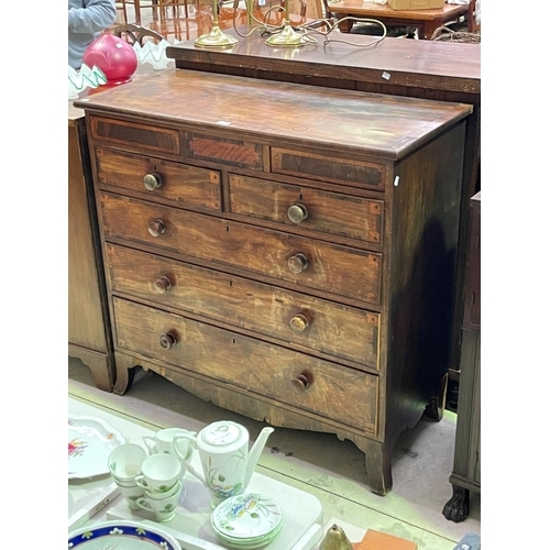 231 - Antique English mahogany and rosewood seven drawer George III chest with wooden knobs on splayed leg... 