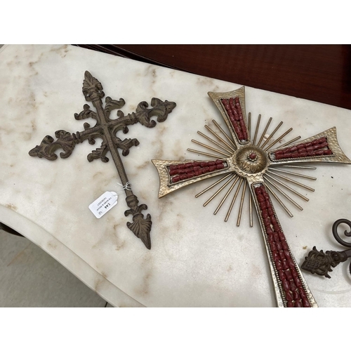 244 - Three metal crosses, one with drop down candle sconce pan, approx 57cm and smaller (2)