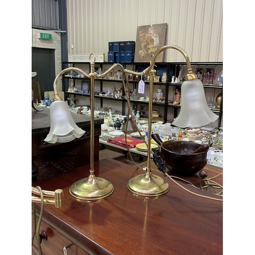 250 - Two goose neck brass lamps with frosted tulip shades along with a brass standard lamp, approx 145cm ... 