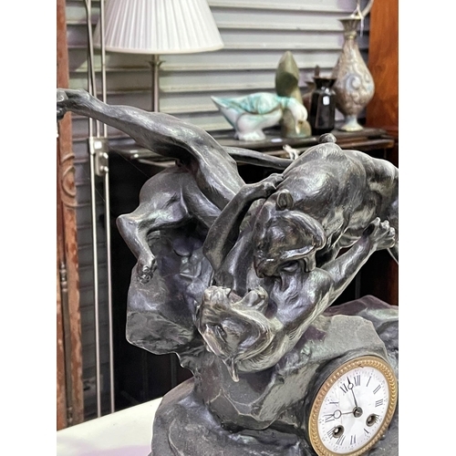 269 - French patinated spelter fighting tiger clock on marble base, with pendulum and key, approx 37cm H x... 