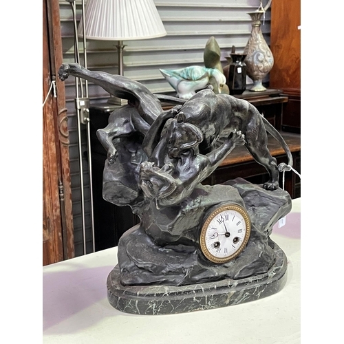 269 - French patinated spelter fighting tiger clock on marble base, with pendulum and key, approx 37cm H x... 