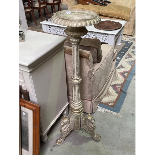 281 - Large painted cast iron floor pricket, with winged lions tri form legs, approx 120cm H