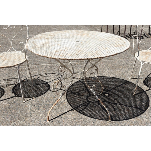 108 - Old French painted wrought iron garden table with four chairs, table approx 71cm H x 98cm dia (5)