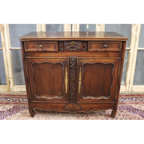 13 - Antique French Louis XV style buffet, two doors below three drawers, carved floral motif in relief w... 