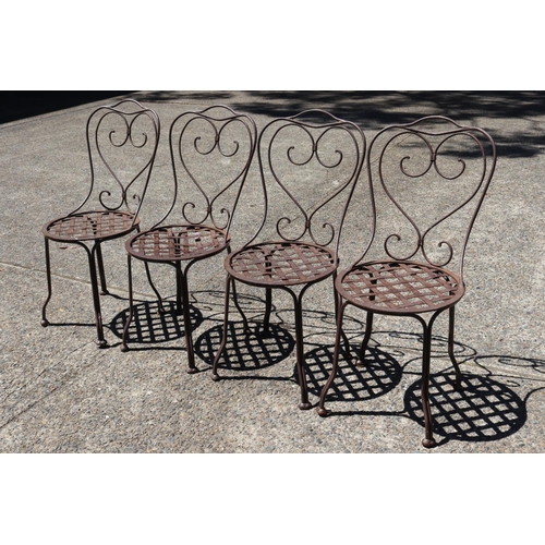 130 - Set of four French wrought iron garden chairs, heart backs & lattice seats (4)