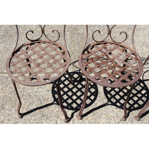 130 - Set of four French wrought iron garden chairs, heart backs & lattice seats (4)