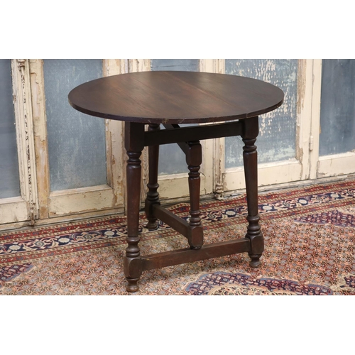132 - Vintage French oak folding circular cricket table, approx 68cm H x 80cm dia
