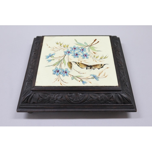 136 - French porcelain musical tile plat, wooden frame, decorated with flowers & butterfly, signed Merlo G... 