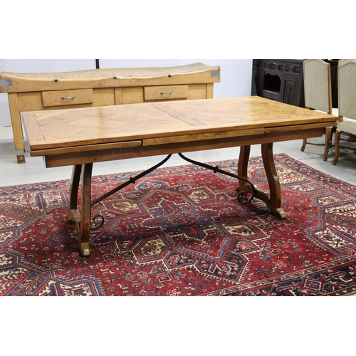 158 - French 18th century style Spanish oak parquetry top dining table, with hand forged wrought iron stre... 