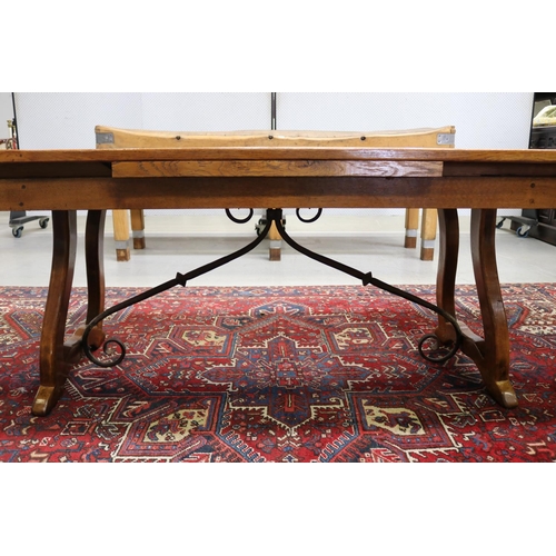 158 - French 18th century style Spanish oak parquetry top dining table, with hand forged wrought iron stre... 