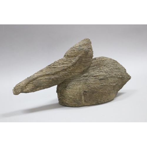 163 - Decorative composite Pelican figure, Morgan & Finch label to base, approx 21cm H x 43cm L