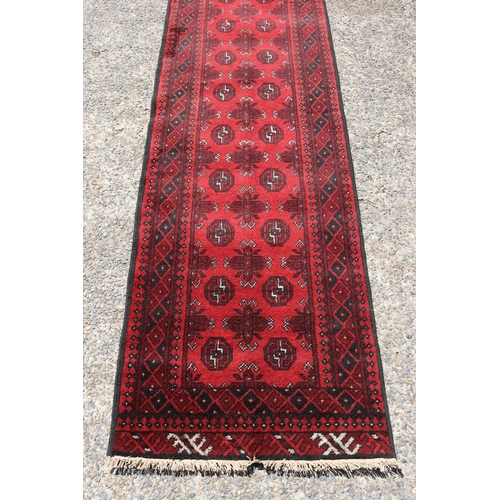 195 - Afghan turkmen rug, approx 285cm x 77cm