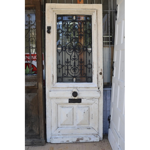 211 - Antique French entrance door, iron hand knocker, letter box slot, wrought iron panel, approx 222cm H... 