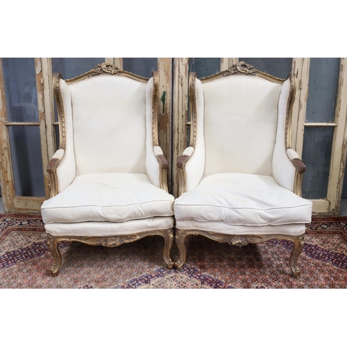 29 - Pair of French Louis XV style generous size wing back armchairs, with linen upholstery, approx 121cm... 