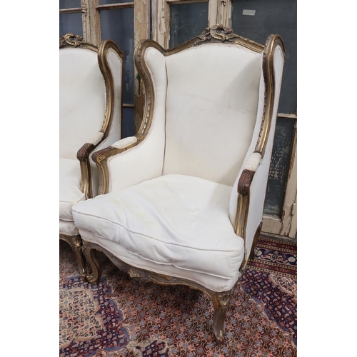 29 - Pair of French Louis XV style generous size wing back armchairs, with linen upholstery, approx 121cm... 