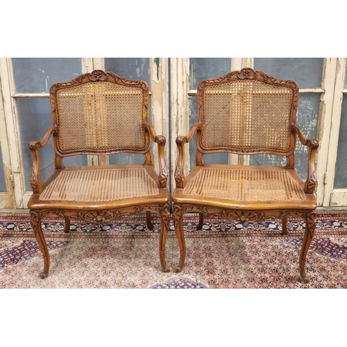 89 - Pair of fine antique French Louis XV style armchairs, cane backs & seats, large wide saddle (2)