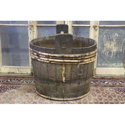 88 - Large antique French twin handled grape barrel, missing some strap work, approx 65cm H (excluding ha... 