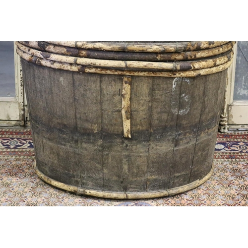 88 - Large antique French twin handled grape barrel, missing some strap work, approx 65cm H (excluding ha... 