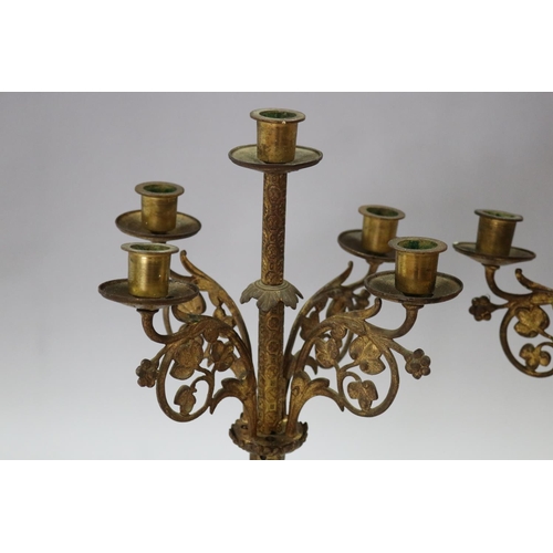 101 - Pair of antique French brass Gothic style five light candelabra, showing signs of been converted to ... 