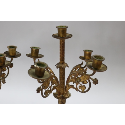 101 - Pair of antique French brass Gothic style five light candelabra, showing signs of been converted to ... 