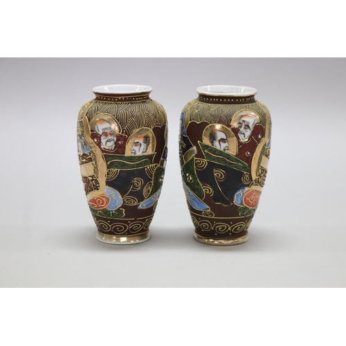 117 - Small pair of decorative porcelain Japanese vases, marked to base, each approx 13cm H (2)