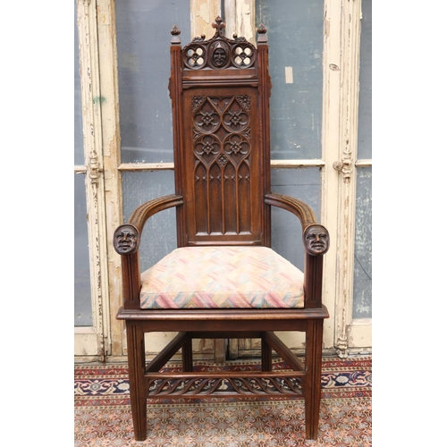 119 - Antique French Gothic style armchair, carved heads to arms, shaped cushion, approx 128cm H x 63cm W ... 