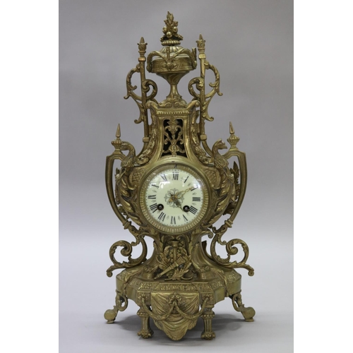 124 - Vintage French Renaissance revival brass cased mantle clock, decorated with swags, trophy & Griffin ... 