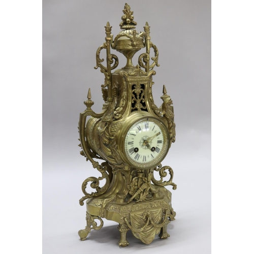 124 - Vintage French Renaissance revival brass cased mantle clock, decorated with swags, trophy & Griffin ... 