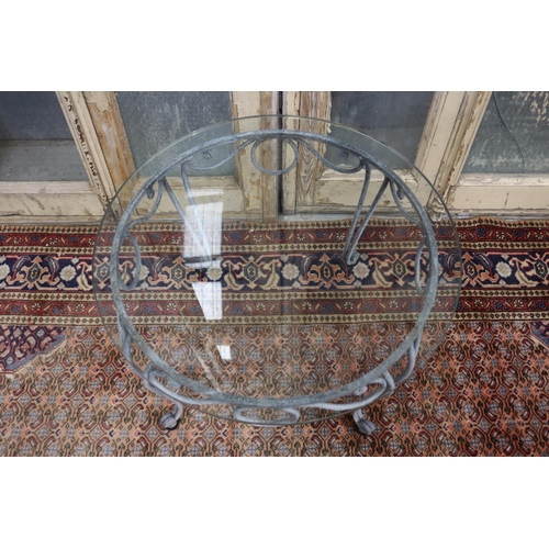 125 - La Forge glass top wrought iron coffee table, approx 41cm H x 65cm dia