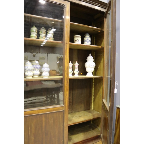 247 - Antique French Louis Philippe mahogany two door bookcase, of plain design, approx 224cm H x 160cm W