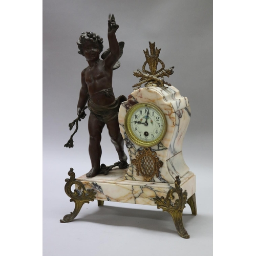 183 - Antique French figural spelter & marble mantle clock, mounted with a putto figure, holding butterfly... 