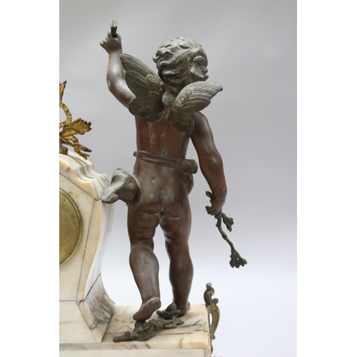 183 - Antique French figural spelter & marble mantle clock, mounted with a putto figure, holding butterfly... 