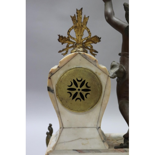 183 - Antique French figural spelter & marble mantle clock, mounted with a putto figure, holding butterfly... 