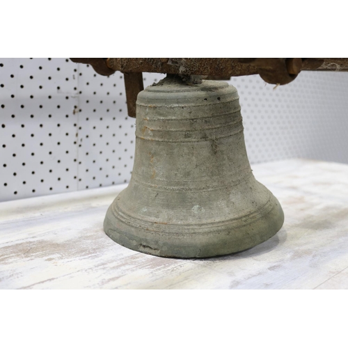 193 - Antique French bronze bell in cast iron frame, bell approx 21cm H x 19cm dia