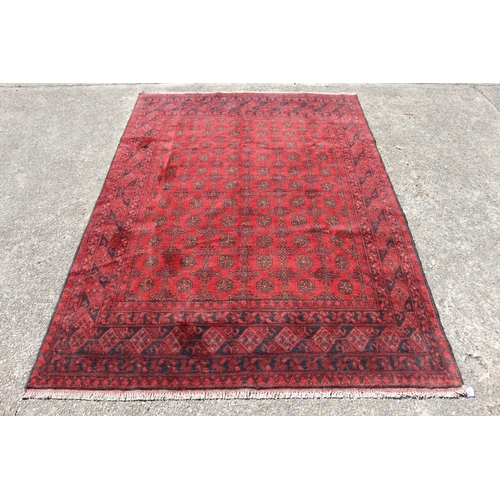 257 - Hand knotted pure wool Afghan rug, approx 282cm x 193cm