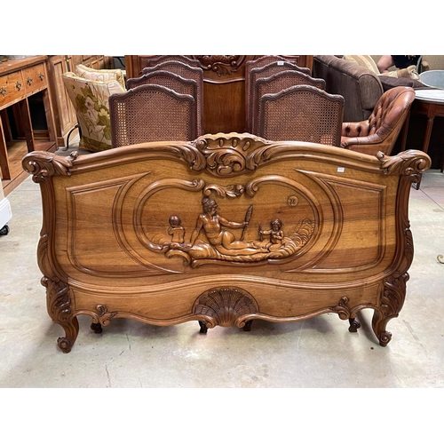 1119 - Antique French carved walnut Louis XV style bed, approx 165cm H x 213cm L x 148cm W