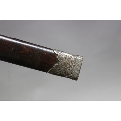 33 - Thai or Burmese silver mounted dha sword. Thai /Burmese border region. Steel blade in good condition... 