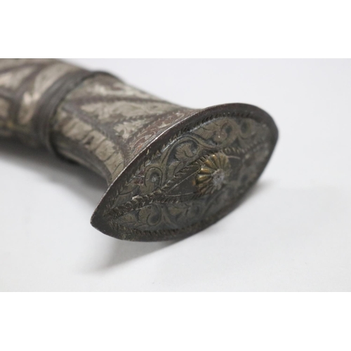 36 - Metal hilt kukri with scabbard. The hilt is decorated with chiselled decorative patterns that are/we... 