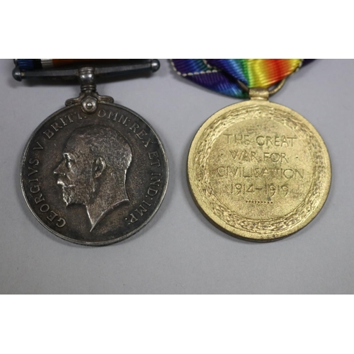11 - Pair of British World War I medals, impressed naming 152930 Gnr H. W. Salt R. A. Excellent condition... 