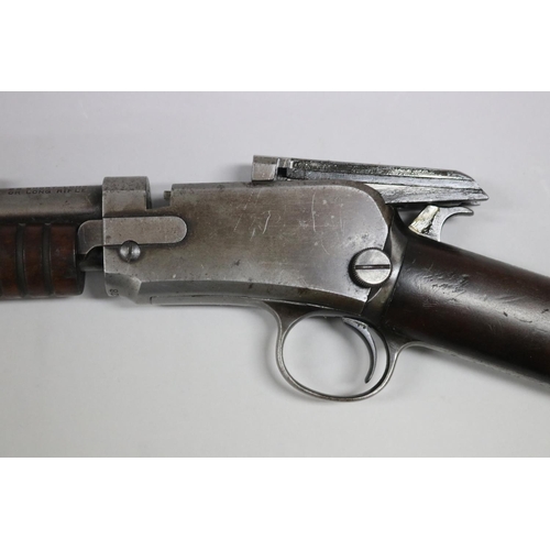 27 - Winchester Model 1906 pump action repeating rifle in .22 RL long rifle calibre with approx 49cm barr... 