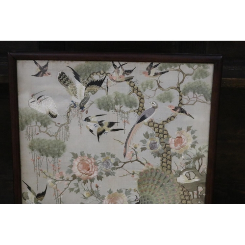 201 - Antique 19th century Asian silkwork panel, peacocks to ground, peony, pheasants and cranes, and othe... 