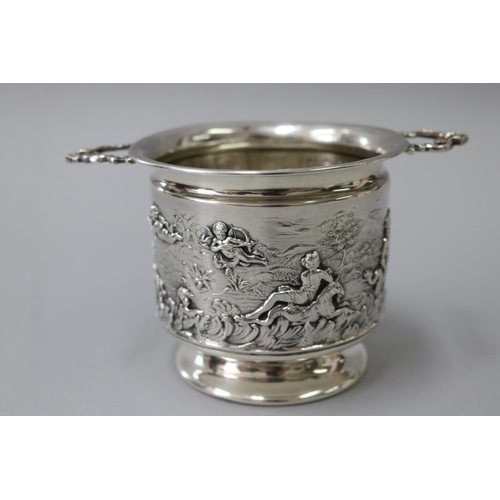 21 - Antique Sterling silver twin handled bowl of cylinder form, repousse decoration in relief marked for... 