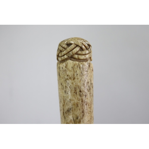 230 - Antique 19th century whale bone fid, carved spliced rope decoration to the top, approx 26 cm L
