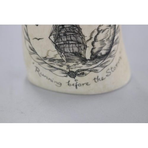 239 - Engraved scrimshaw, Running before the Storm, approx 10cm L